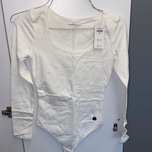 White cotton long sleeve body suit